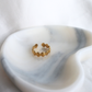 Gold ring on a marble surface